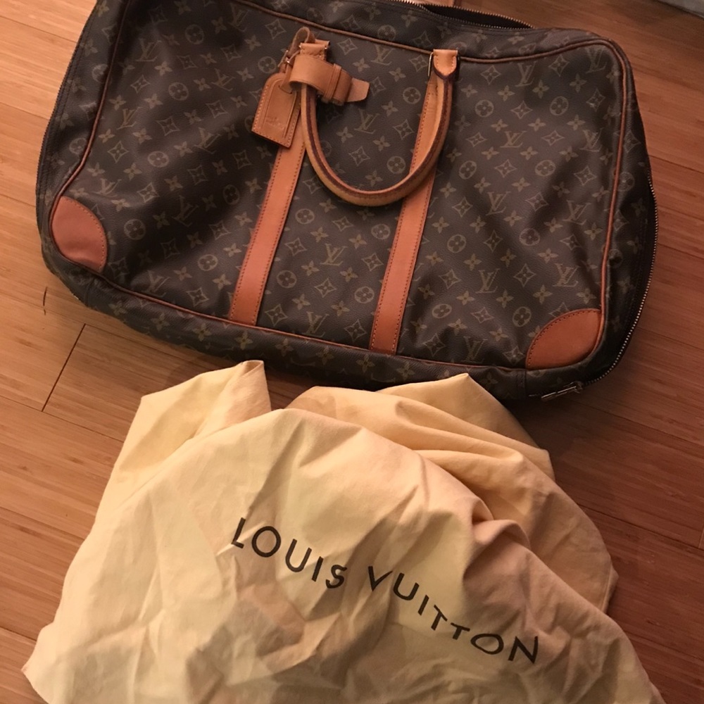 Authentic 54 serius Louis Vuitton travel bag